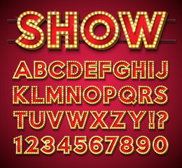 Light Bulb Alphabet with gold frame and shadow on red backgrond. Glowing retro vector font collection with shiny bright lights. ABC and number design for casino, night club or cinema. Layered © articular