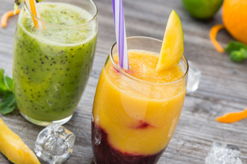 Healthy diet, fresh rapberry-mango and kiwi smoothie