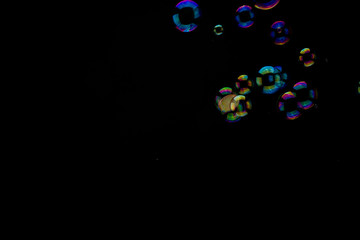 Soap bubbles on a black background