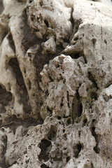 Grey spoiled stone. Closeup shot