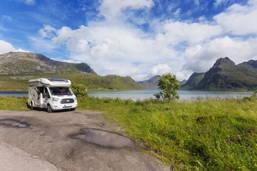 Poster Beautiful scandinavian landscape with mountains and fjords. Car trip on camper car. Lofoten islands, Norway. © Konstantin Aksenov
