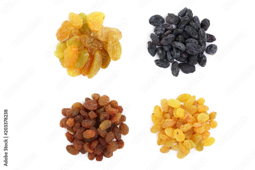 Wall mural Collection of raisins isolated on a white background. Top view. Flat lay