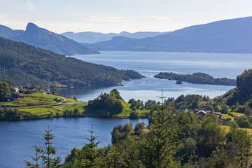 Beautiful aerial view of Roldalsvatnet lake with typical scandinavian villages in the municipality of Odda, Norway