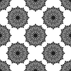 Seamless pattern with abstract flowers. Fashion textile print. Asian fabric background. Vector monochrome design. Perforation floral holes.