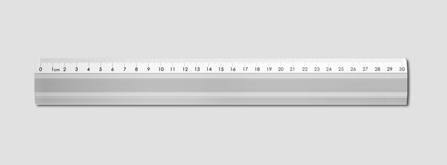 Metal ruler isolated on grey background