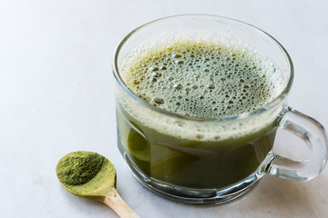 Hot Organic Green Matcha Tea in Glass.
