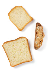 sliced bread and cookies isolated on white