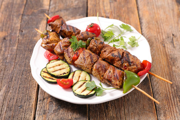 grilled beef skewer and zucchini
