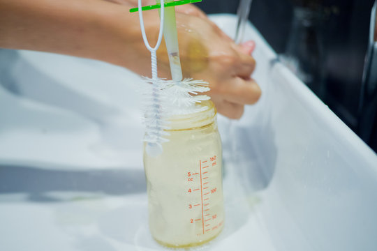 Washing Bottle Of Milk  For Baby, Clean Bottle Milk