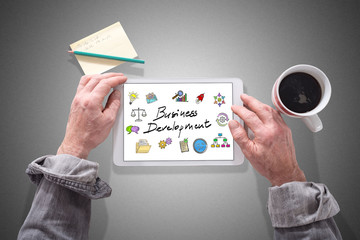 Business development concept on a tablet