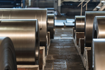 Stock with rolls of sheet steel in industrial plant