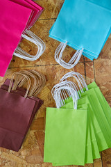 Paper bags factory colorful set on wood