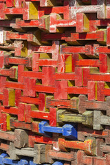 Stack of colorful wooden beams