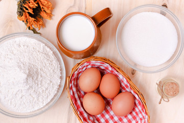 Wicker basket of eggs, heap