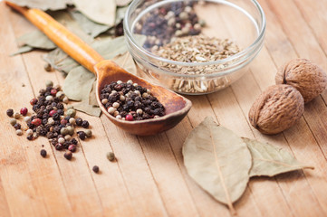 Walnuts, black pepper, bay leaf