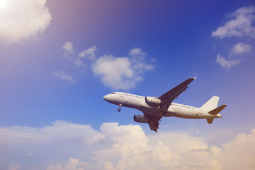 Airplane with beautiful sky on background