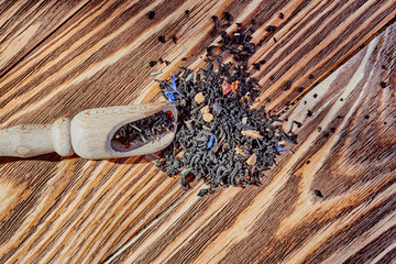 Dry tea in wood spoon