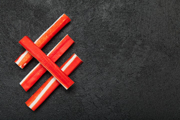 Asian surimi appetizer. Imitation crab stick. Copy space for text.