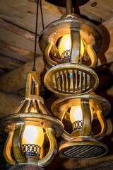 Beautiful electric lamp in a wooden house