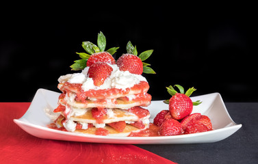 Strawberry pancakes on a plate
