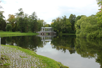 Fototapeta na wymiar Marble bridge in Catherine Park in Tsarskoye Selo in Pushkin, St. Petersburg, Russia.