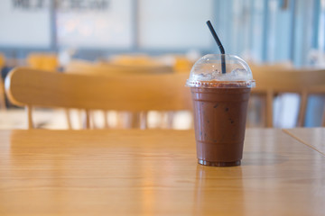 Ice chocolate on a wooden table