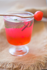Refreshing summer drink with cherry