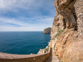 The rocky peninsula of Capo Caccia, with high cliffs, is located near Alghero; in this area there are the famous Neptune's Caves
