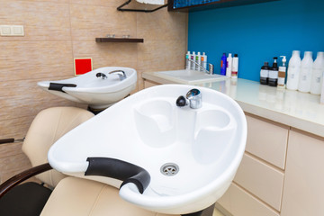 Hair washing sink in beauty salon