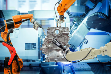 Industrial robotic working with auto parts on smart factory