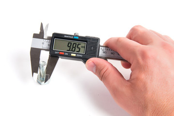 Precise measurement of metal part. Measuring with electronic digital caliper