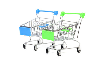 close up of mini shopping cart on white background