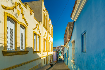 Colorful narrow street in Santiago de Cuba 