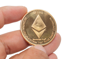 close up hand holding bitcoin on white background