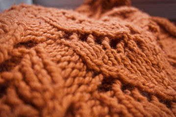 Orange knitted wool fabric