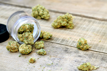 Marijuana Buds Spilling Out of Jar (Sativa Dominant Strain, Green Crack)