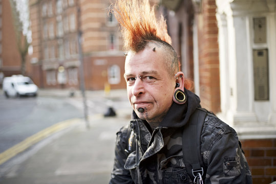 Portrait of a male punk with mohican hair