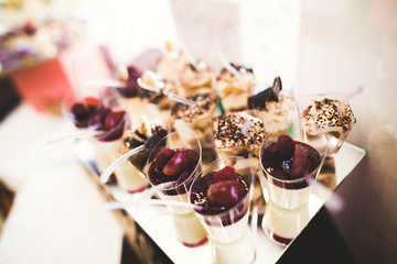 Different kinds of baked sweets on a buffet