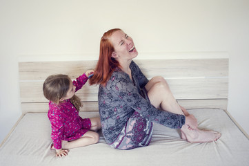 Fototapeta premium Daughter care her mother