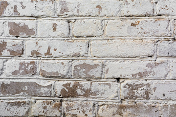 texture painted old brick wall, damaged uneven brickwork, abstract background