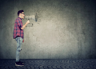 Man spreading news with megaphone