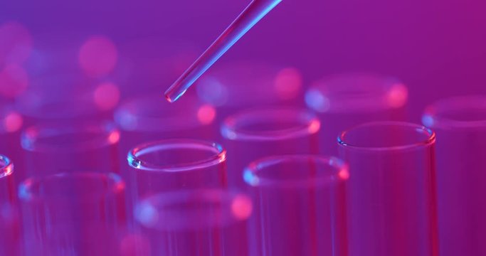 Dropping liquid to test tubes