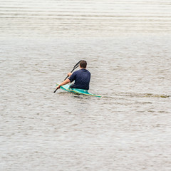 a man sails on a kayak