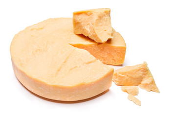 Whole round Head and pieces of parmesan or parmigiano