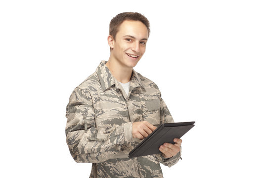 Air force airman using digital tablet