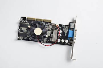 Retro video card on white background. Computer parts.