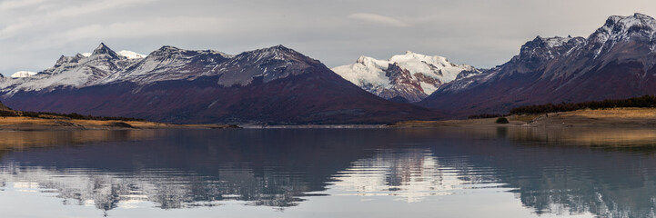 Mountain range reflecting in Lake Argentina