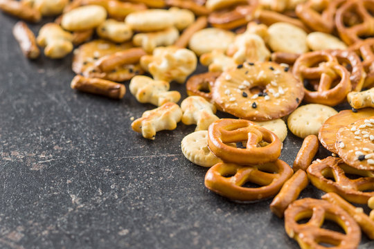 Mixed salty snack crackers and pretzels.