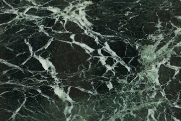 The dark green marble.