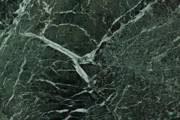 The dark green marble.